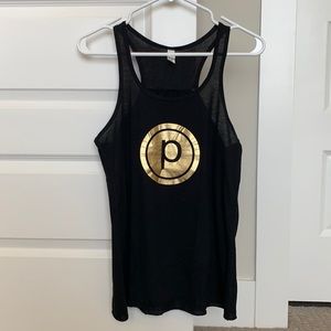 Pure barre black tank top with gold circle p